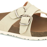 White slip-on flats, showcasing its design and material details.