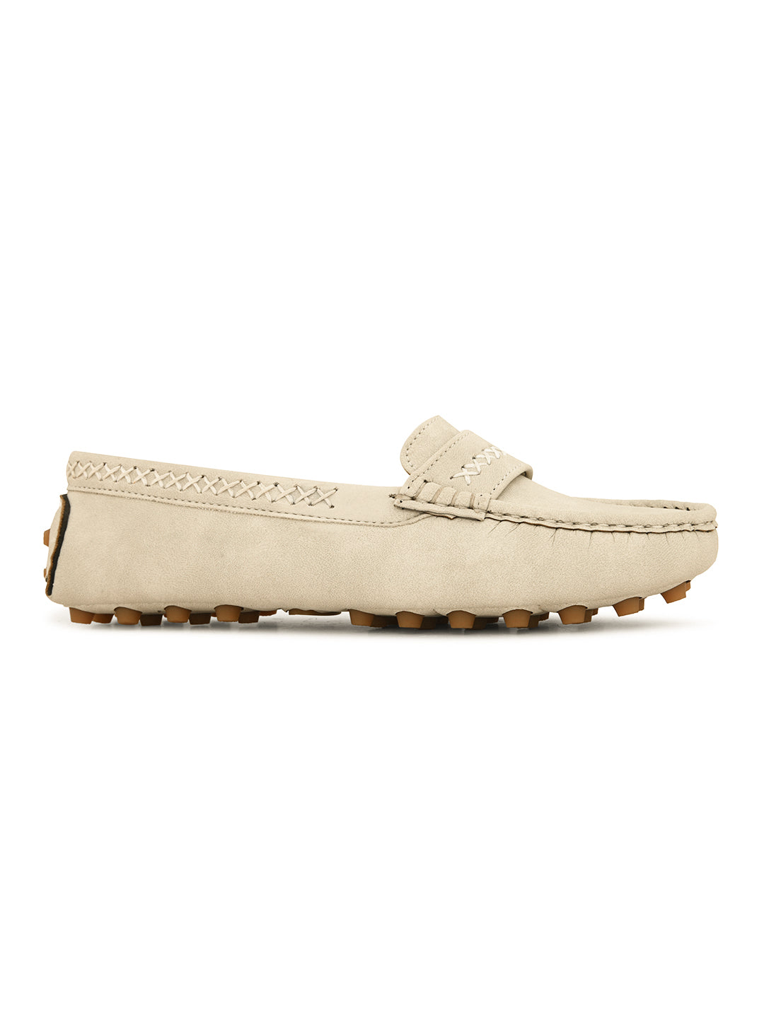 Beige suede driving loafer with stitched details, cross-stitched vamp band, and studded rubber sole.