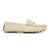Beige suede driving loafer with stitched details, cross-stitched vamp band, and studded rubber sole.