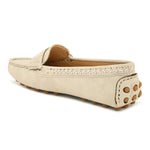 Beige suede driving loafer with stitched details, cross-stitched vamp band, and studded rubber sole.