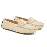 Women’s Lightweight Round Toe Loafers in beige suede with stitched details, cross-stitched vamp band, and studded rubber sole.