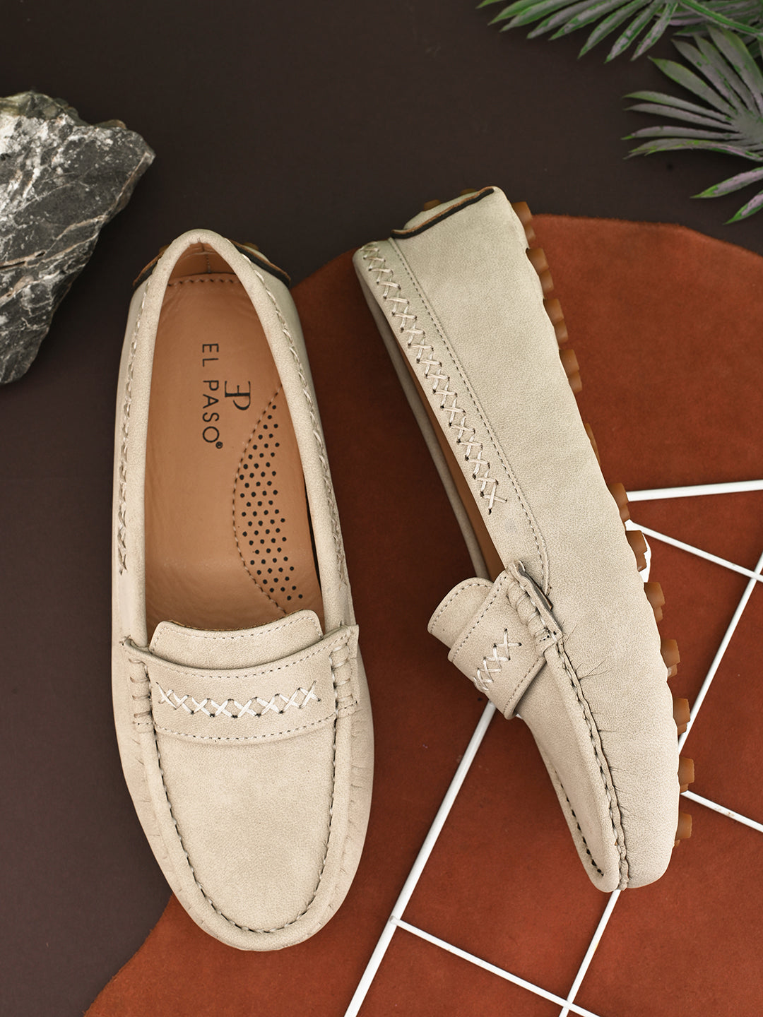 Women’s Lightweight Round Toe Loafers in beige suede with stitched details, cross-stitched vamp band, and studded rubber sole.