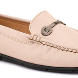 Beige leather loafer with black sole and silver buckle detail. add women's casual slip on loafers